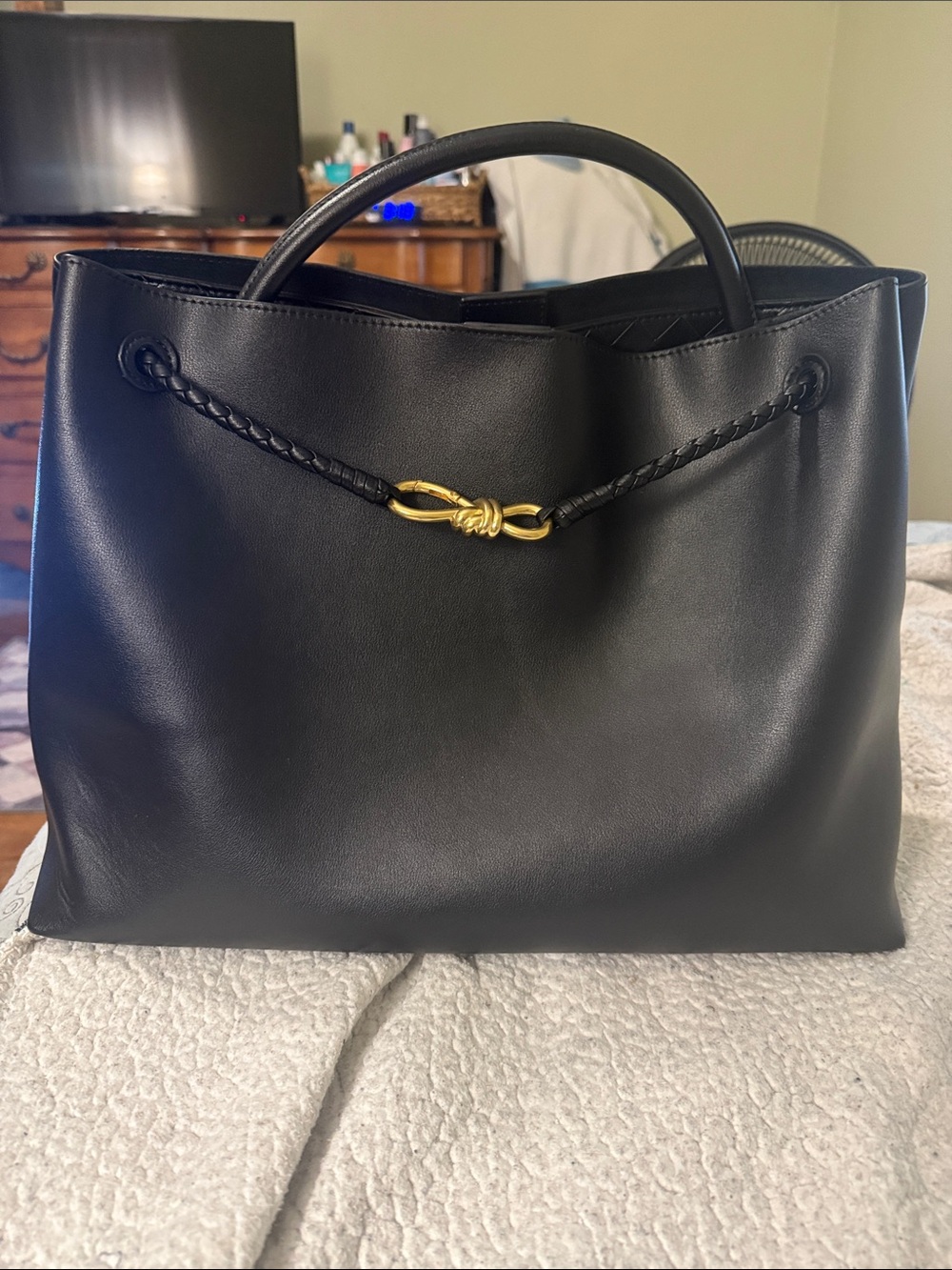 Black Leather Shoulder Tote with Braided Detail and Gold Accent